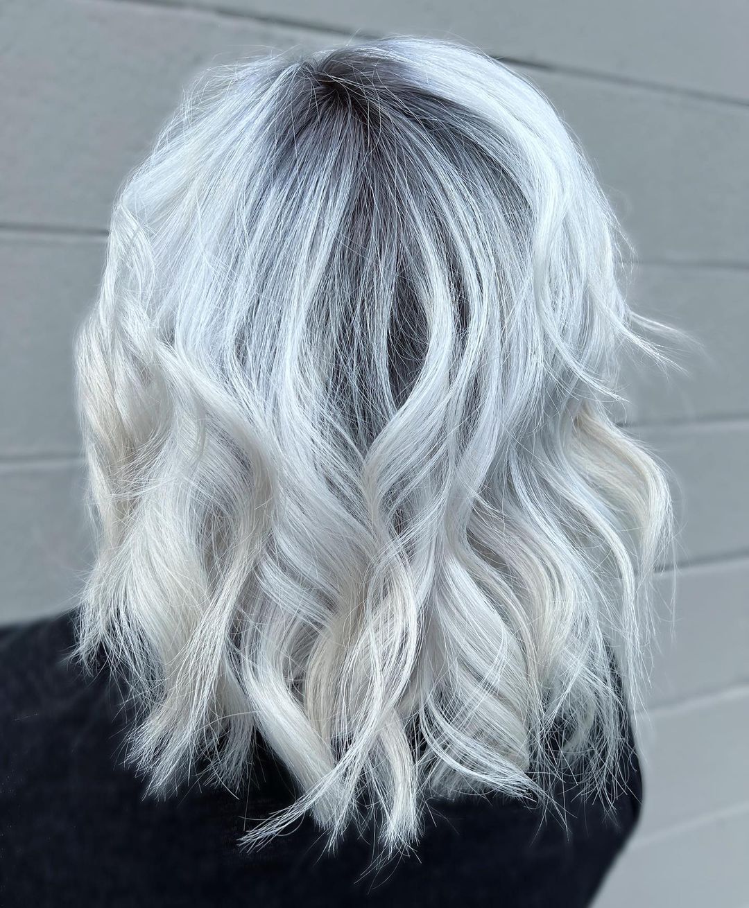 Mid-Length Snow-White Hair with Black Roots