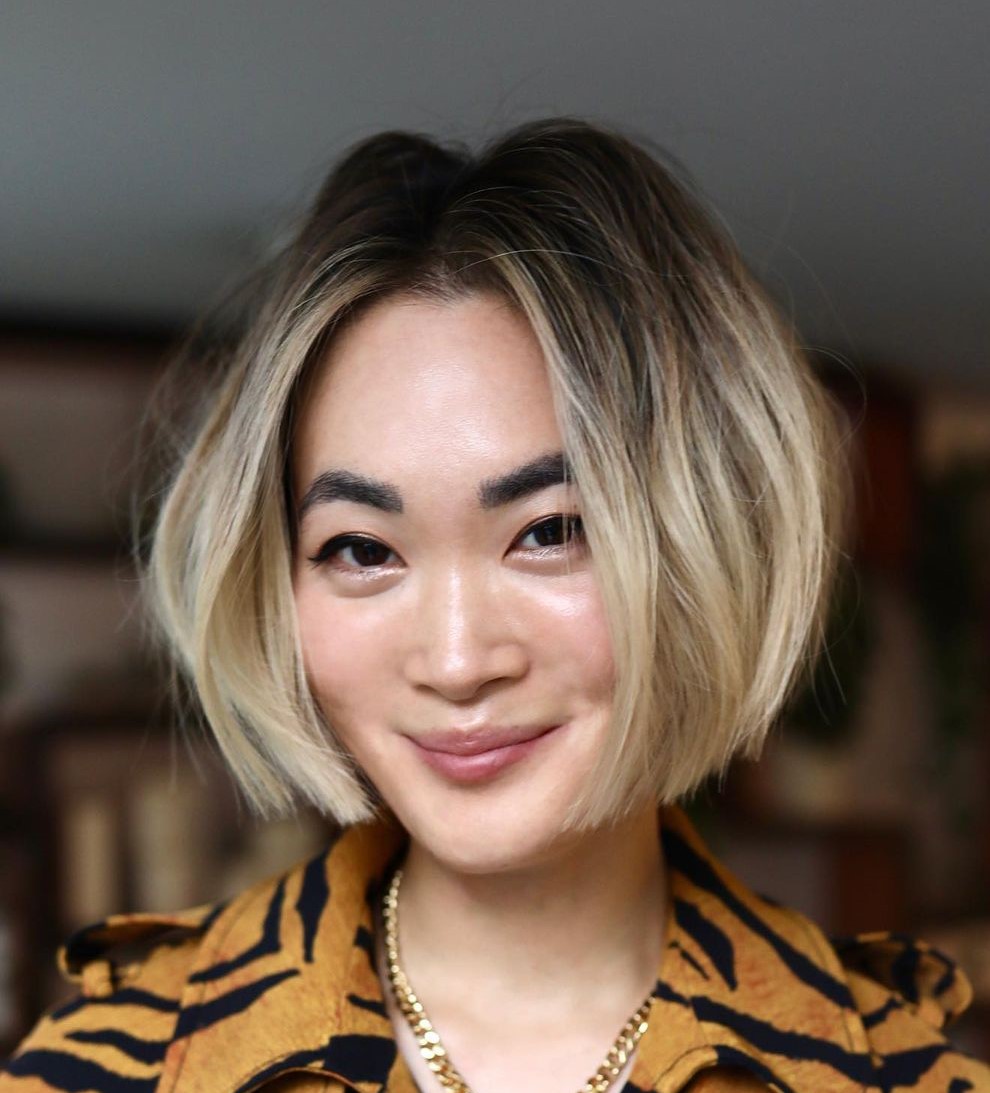 Short Edgy Blonde Bob with Dark Roots